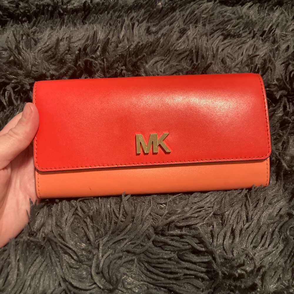 Red and orange Michael Kors wallet